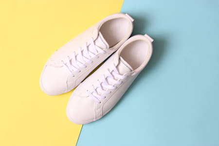 mens sneakers on a colored background. Mens footwear. minimalism.の写真素材