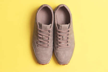 mens sneakers on a colored background. Mens footwear. minimalism.の写真素材