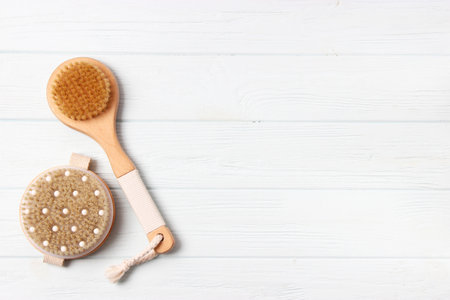 brush for dry massage on a colored background top view.の写真素材