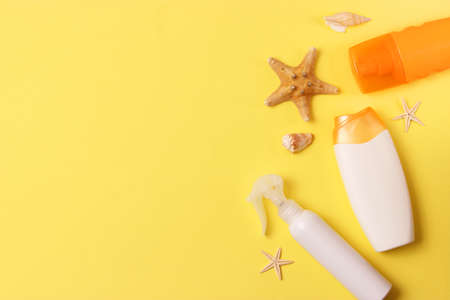 sunscreens on a colored background. Protection of the skinの写真素材