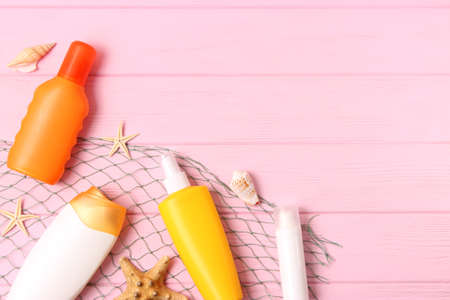 sunscreens on a colored background. Protection of the skin