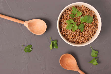 boiled buckwheat in a plate on the table.の写真素材