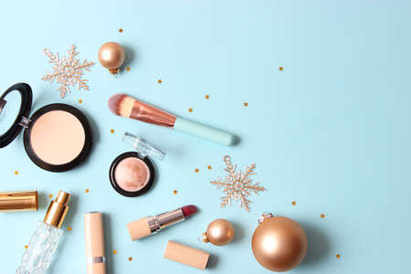 Set of professional decorative cosmetics and Christmas accessoriesの写真素材