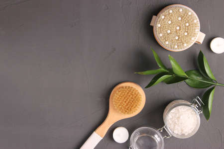 brush for dry massage on a colored background top view.