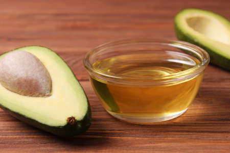 Avocado and avocado oil close up on the table