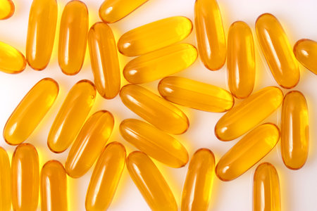 Omega-3 capsules on a white background. Fish oil, healthy supplementsの写真素材