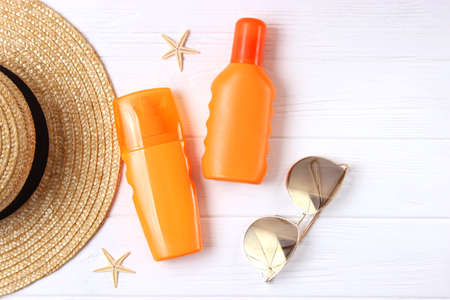 sunscreens on a colored background. Protection of the skinの写真素材