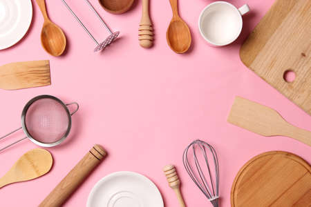 set of dishes close-up on a colored background. Kitchen appliances.の写真素材