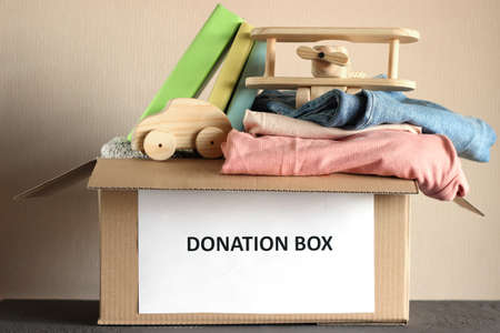 cardboard box with donations with clothesの写真素材