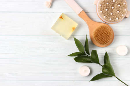 brush for dry massage on a colored background top view.の写真素材