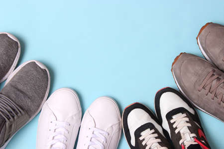 mens sneakers on a colored background. Mens footwear. minimalism.