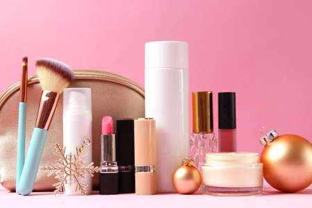 Set of professional decorative cosmetics and Christmas accessoriesの写真素材