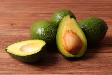 Avocado close-up on a colored backgroundの写真素材