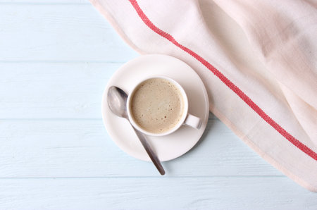 Cup of coffee with froth close up with place for textの写真素材