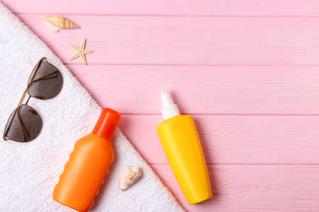 sunscreens on a colored background. Protection of the skinの写真素材