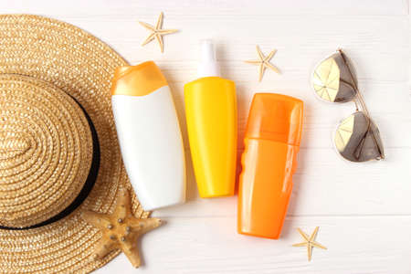 sunscreens on a colored background. Protection of the skin