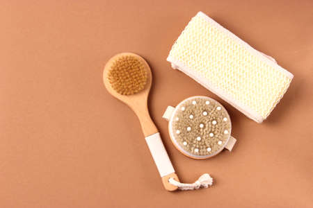 brush for dry massage on a colored background top view.の写真素材