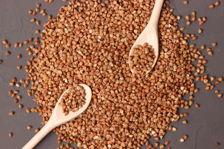 raw buckwheat on a colored background.の写真素材