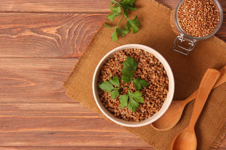 boiled buckwheat in a plate on the table.の写真素材