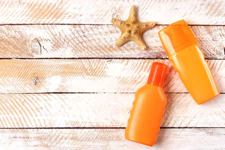 sunscreens on a colored background. Protection of the skin