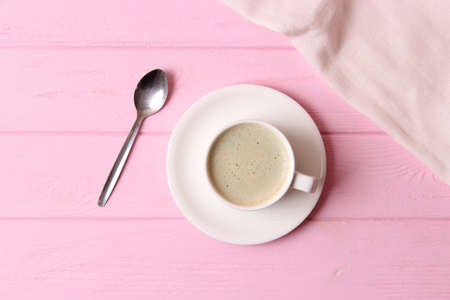 Cup of coffee with froth close up with place for text