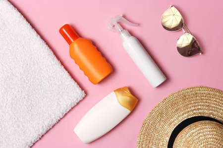 sunscreens on a colored background close-up. Sun protection for skinの写真素材