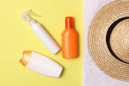 sunscreens on a colored background close-up. Sun protection for skin,の写真素材