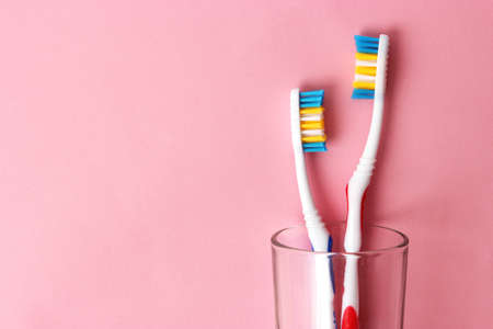 toothbrushes on a colored background close upの写真素材