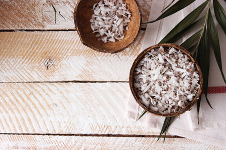natural coconut flakes on the table close-up