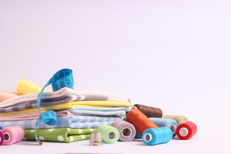 sewing accessories close-up. hobbies, fabrics and threads for sewing
