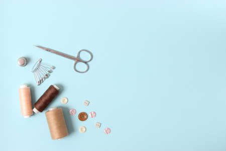 sewing accessories close-up. hobbies, fabrics and threads for sewing