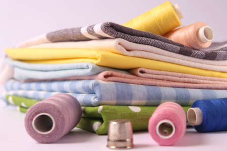 sewing accessories close-up. hobbies, fabrics and threads for sewing