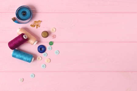 sewing accessories close-up. hobbies, fabrics and threads for sewingの写真素材