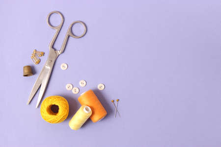 sewing accessories close-up. hobbies, fabrics and threads for sewing