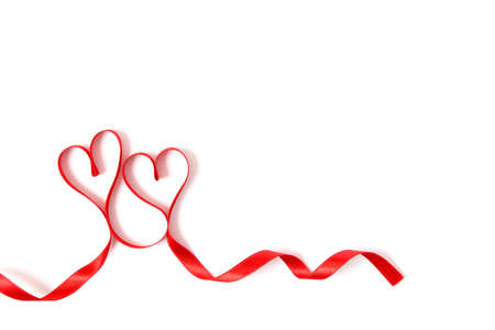 hearts from ribbons on a white background top view.の写真素材