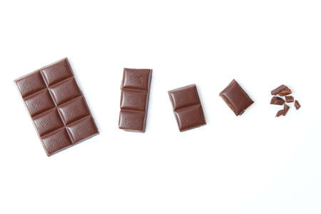 pieces of chocolate isolated on white.の写真素材