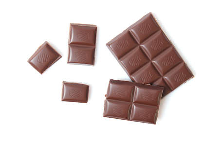 pieces of chocolate isolated on white.の写真素材