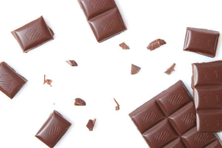 pieces of chocolate isolated on white.