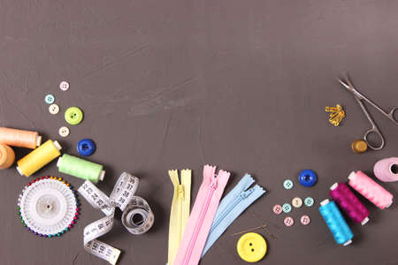 sewing accessories close-up. hobbies, fabrics and threads for sewing