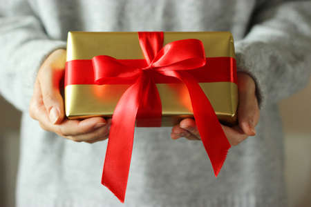 gift box in female hands. Holiday, give, gift.