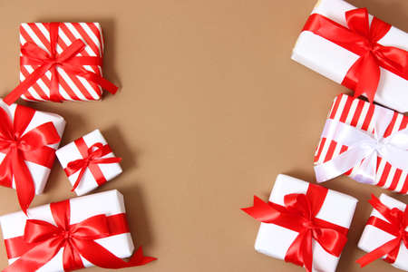 Set of beautifully wrapped gift boxes on a colored background top view.の写真素材