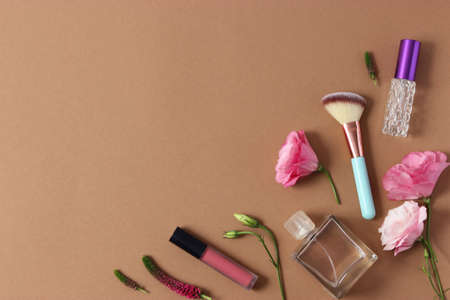 perfume and flowers on a colored background.の写真素材