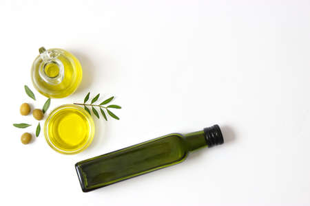 olive oil in a bottle on a white background top view.の写真素材