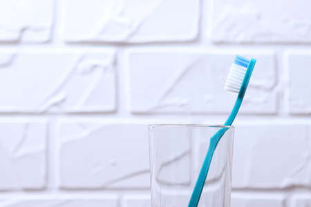 Toothbrushes and oral cleaners on the table.の写真素材