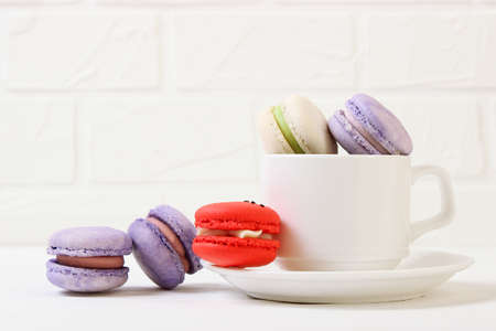 macaroons on a colored background top view.の写真素材