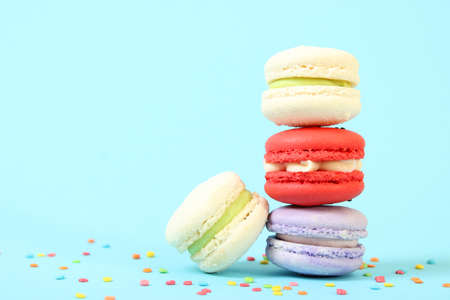 macaroons on a colored background top view.の写真素材