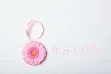 Background for the holiday of March 8 on a colored background top view.の写真素材