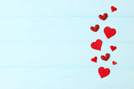Gifts and hearts on a colored background top view. Love.