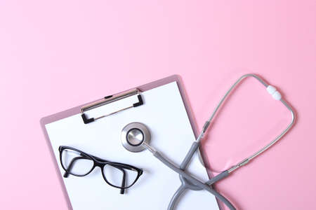 Doctors desk top view. Set of different doctor accessories.の写真素材