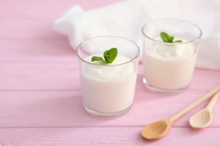 Natural white yogurt on the table. Healthy snack, Greek yogurt.の写真素材
